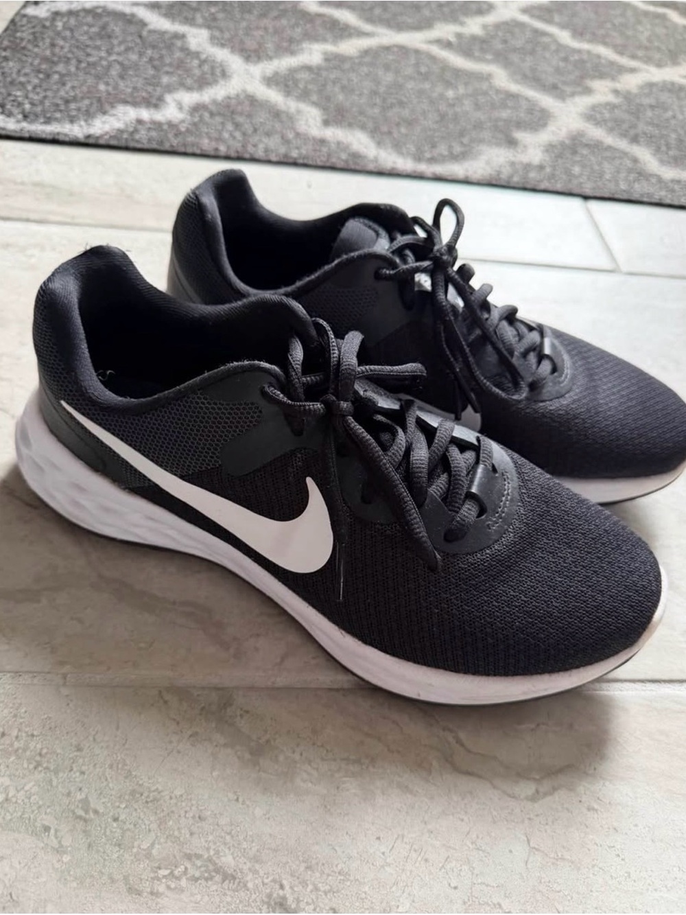 Nike Black Athletic Sneakers with White Swoosh